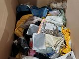 a box full of clothes and other items in it