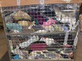 a metal cart with many items in it in a warehouse