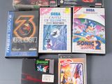 many video games that are on the table next to each other