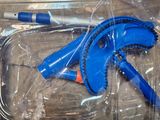 a plastic box with a pair of scissors in it