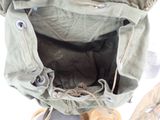 a pair of shoes and a bag on the ground