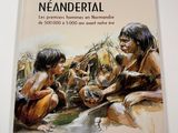 the cover of the book neanderial, with two children sitting on a rock