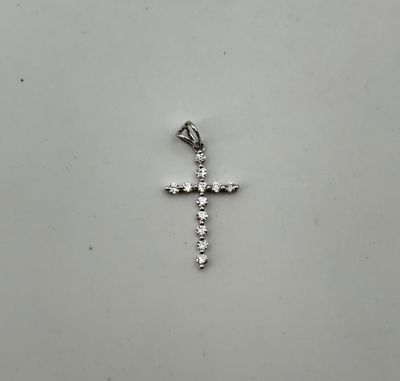 Croix en or blanc 750°/.(18K) sertie de diamants taille bril…