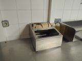 a toaster that is sitting on a counter in a kitchen