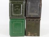 three green and black trash cans stacked on top of each other
