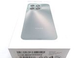 the back of a white box with a picture of a phone inside of it
