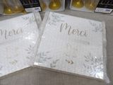 two napkins that are sitting on a table