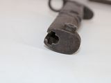 an old key that is laying on a table