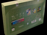 a green box with stickers on the inside of it
