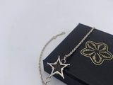 a black book with a chain and a star on it