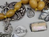 a table with a bunch of jewelry on it
