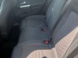 the back seats of a car with a seat belt in a car