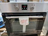 a silver oven that has a price tag on it