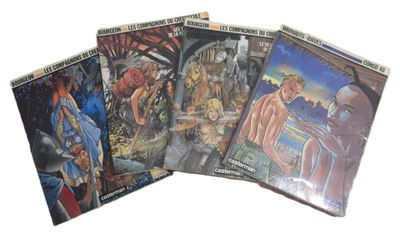 quatre livres posés sur une surface blanche