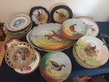 a lot of plates that are sitting on a table