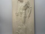 plaster sculpture of a man holding a fish