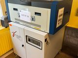 a machine that is sitting in the corner of a room