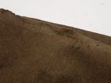 a close up of a piece of brown fabric on a table