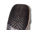 a close up of a pair of shoes wrapped in plastic