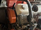 an image of a chainsaw in a garage