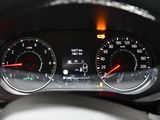 a close up of a car dashboard with a speedometer and gauges