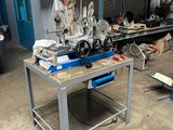 a machine that is sitting on a table in a garage