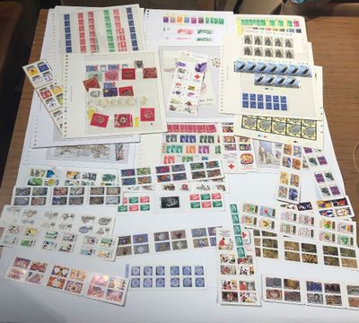 a table with a lot of stamps on it