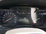 a close up of a car dashboard with a speedometer and gauges