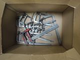 a cardboard box with a bunch of tools inside of it