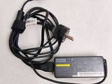 an image of a laptop charger with a cord attached