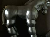 a statue of a horse that is standing on a pedestal