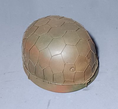 an image of a military helmet on a white surface