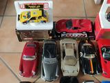 a lot of toy cars that are on the floor