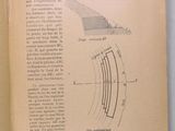 an open book with a drawing of a plane on it