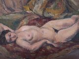 tableau représentant une femme nue allongée sur un canapé dans un salon