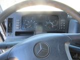 dashboard of a car with a steering wheel and gauges on it