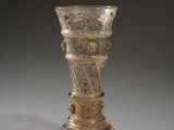 a glass vase that is sitting on a table