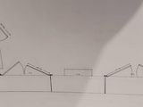 a picture of a drawing of a house on a piece of paper