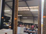 a large mirror in the middle of a room