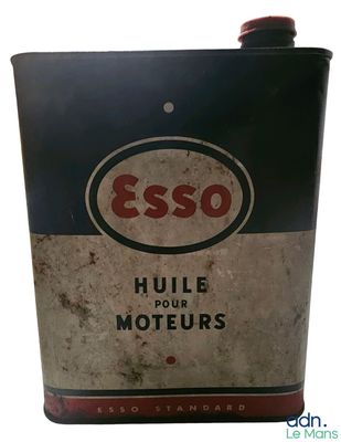 a black and red tin with an esso logo on it