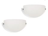 two white sconces on a white wall with a white background