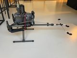 an image of a camera on a tripod in a room