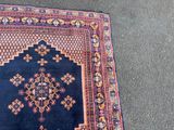 an image of a rug on the ground with a cat laying on it