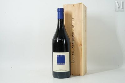 the bottle of red wine is next to a wooden box