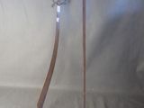 pair of old wooden swords with metal handles on a white background