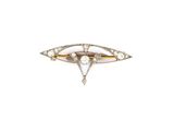 an antique diamond and gold broochle broochle