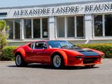 an image of a red sports car parked in front of a building