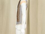 a mannequin dressed mannequin with a scarf on it