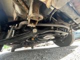 a close up of a car ' s exhaust pipe and exhaust pipe