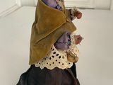figurine of a woman with a baby in her arms